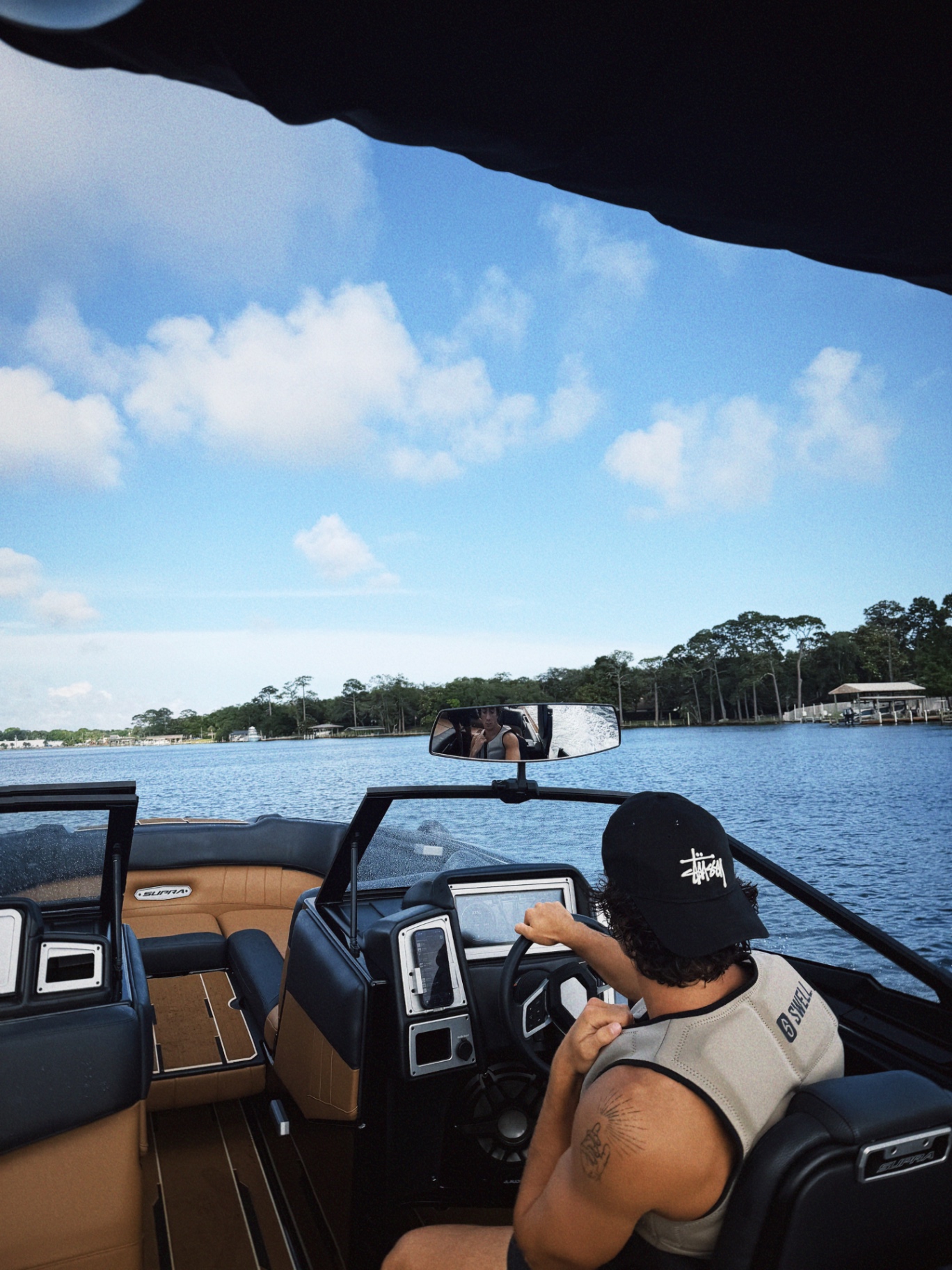 Helm view from inside the Supra with open water ahead
